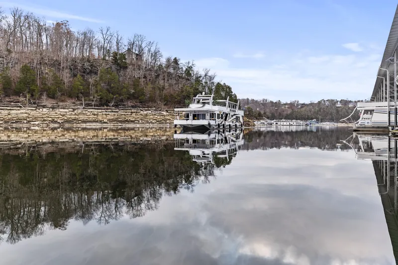 Slide: The Image of Houseboat on calm lake with wooded shoreline, Sharpe 20 x 100, 2009 model. - 38
