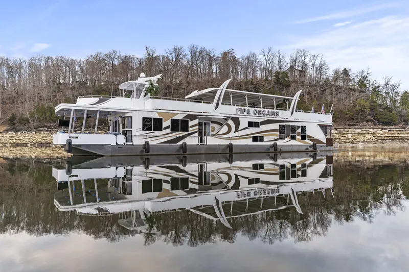 Slide: The Image of Houseboat "Pipe Dreams" on calm lake, Sharpe 20 x 100, 2009 model. - 41