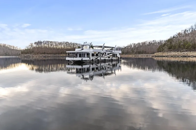 Slide: The Image of Houseboat on serene lake, Sharpe 20 x 100, 2009 model, reflecting in calm water. - 42