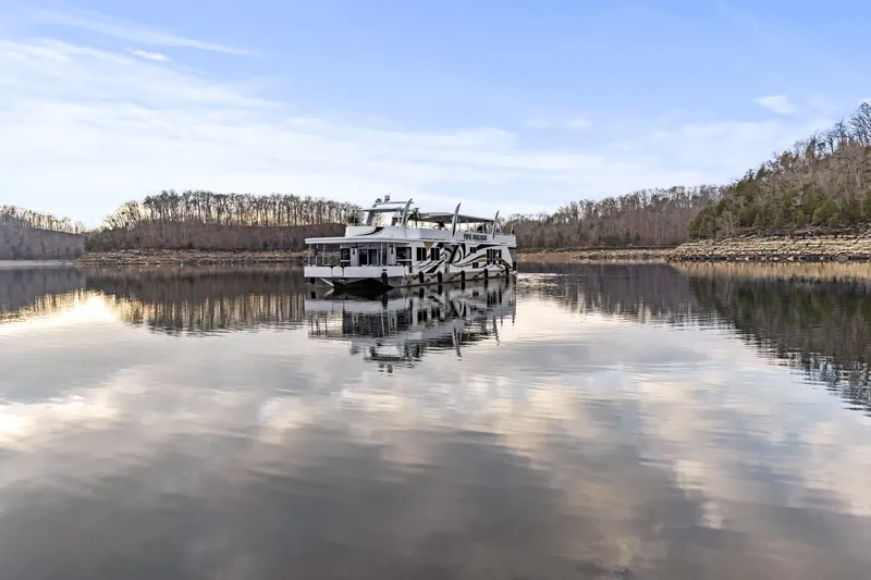 Slide: The Image of Houseboat on serene lake with forested shoreline, Sharpe 20 x 100, 2009 model. - 44