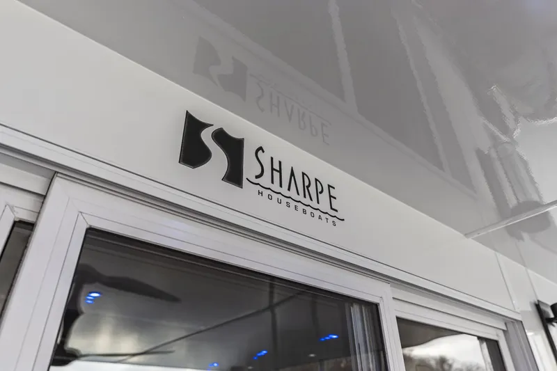 Slide: The Image of Sharpe Houseboats logo on a 2009 model 20 x 100 houseboat. - 9