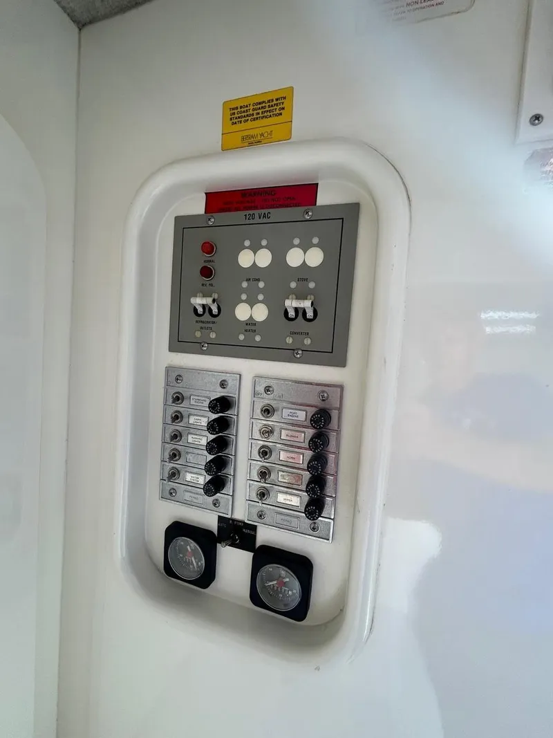 Slide: The Image of Electrical control panel on a 1988 Bertram 28 Moppie boat. - 13