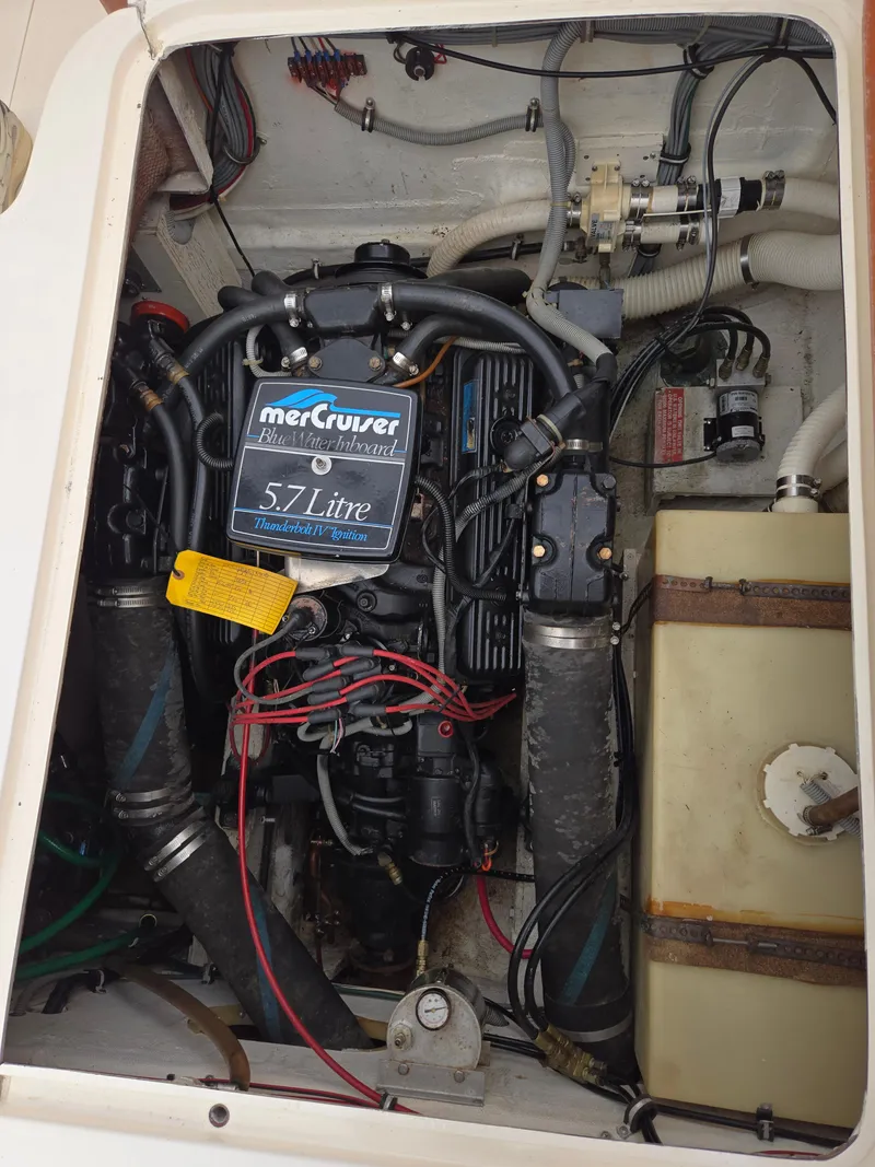 Slide: The Image of Engine compartment of a 1988 Bertram 28 Moppie with a 5.7L MerCruiser engine. - 36