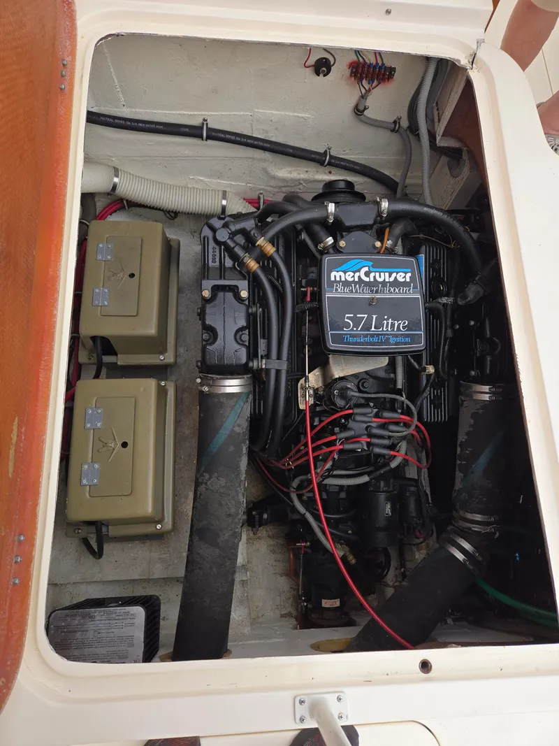 Slide: The Image of Engine compartment of a 1988 Bertram 28 Moppie with MerCruiser 5.7L engine. - 39