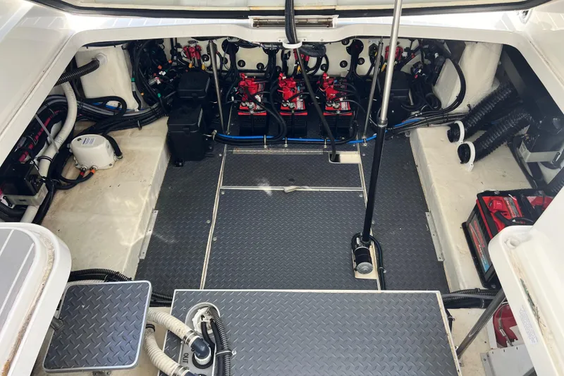 Slide: The Image of Engine compartment of 2023 Formula 330 CBR boat, showcasing wiring and components. - 12