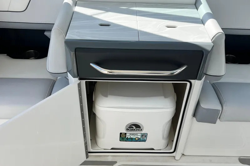 Slide: The Image of 2023 Formula 330 CBR boat interior with built-in cooler storage. - 7