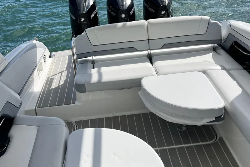 Slide: The Image of 2023 Formula 330 CBR boat interior with seating and outboard motors. - 9