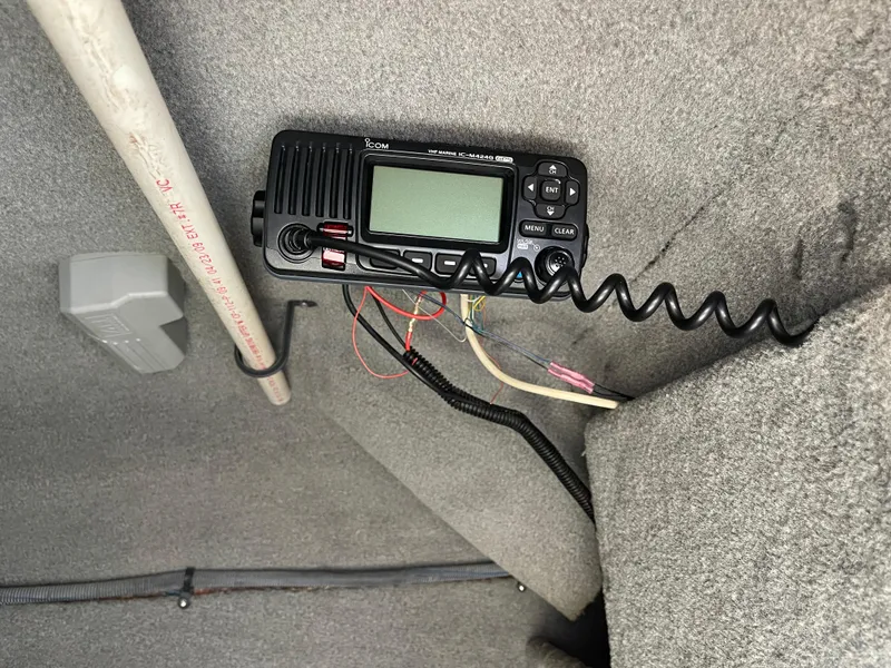 Slide: The Image of 2007 Chaparral 256 SSi boat interior with mounted radio equipment. - 22