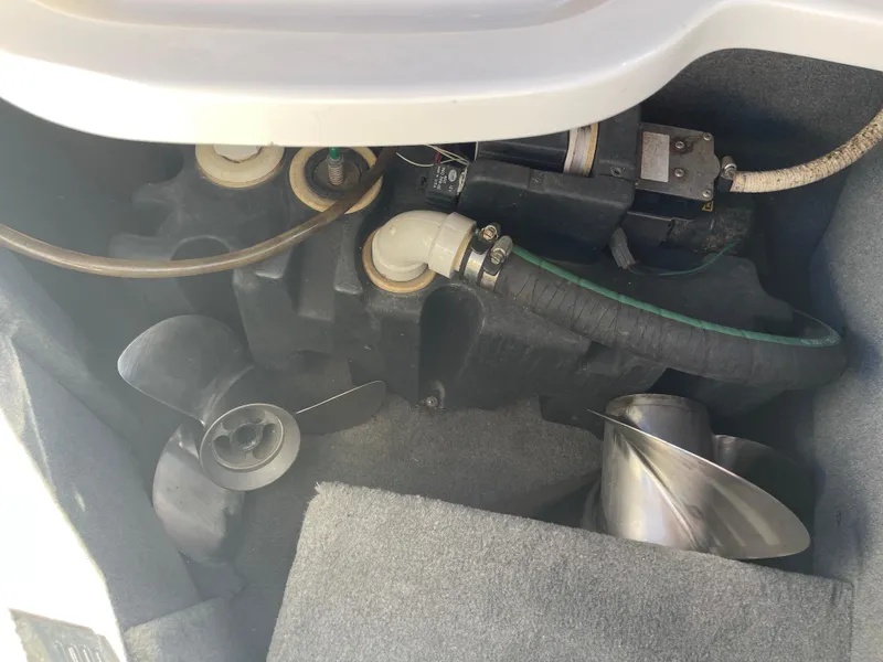 Slide: The Image of 2007 Chaparral 256 SSi engine compartment with propeller and mechanical components. - 27