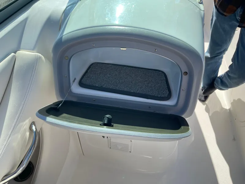Slide: The Image of Open storage compartment in 2007 Chaparral 256 SSi boat interior. - 28