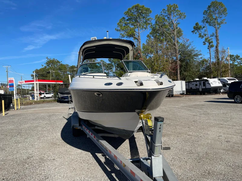 Slide: The Image of 2007 Chaparral 256 SSi boat on trailer in parking lot, clear sky background. - 3