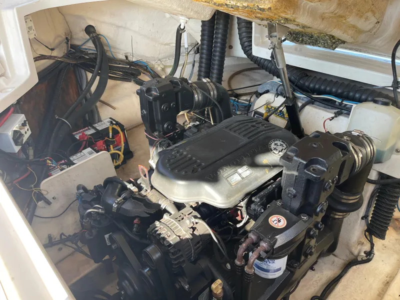 Slide: The Image of Engine compartment of a 2007 Chaparral 256 SSi boat, showing detailed mechanical components. - 32