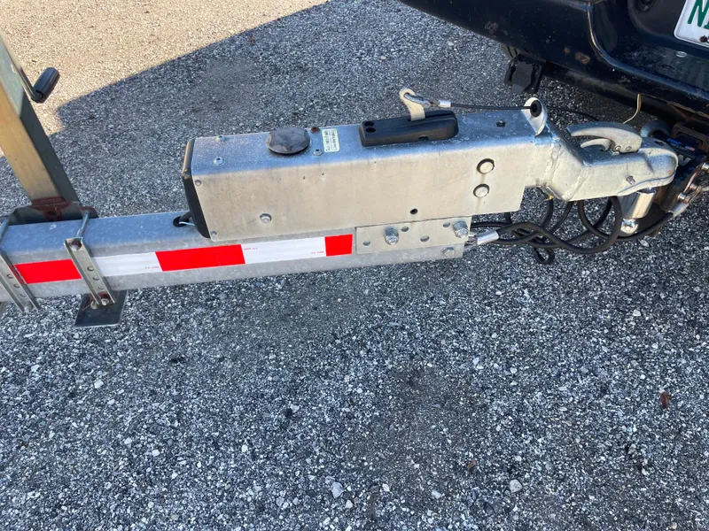 Slide: The Image of Trailer hitch of a 2007 Chaparral 256 SSi on gravel surface. - 39
