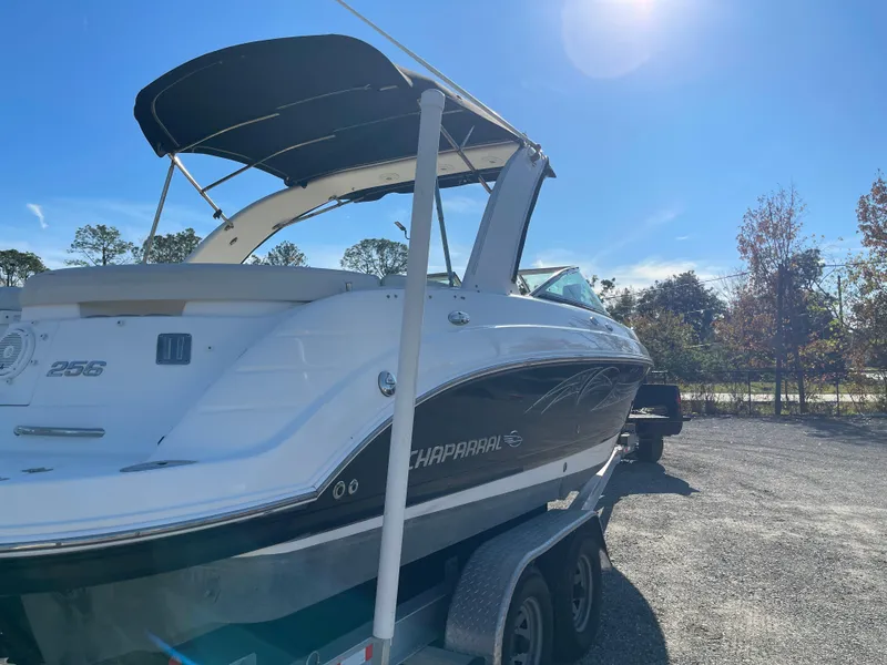 Slide: The Image of 2007 Chaparral 256 SSi boat on trailer under clear blue sky. - 7