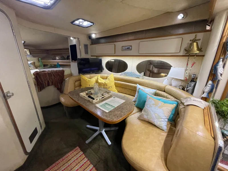 Slide: The Image of Bathroom interior of 1993 Sea Ray 370 Sundancer yacht, featuring shower and toilet. - 21