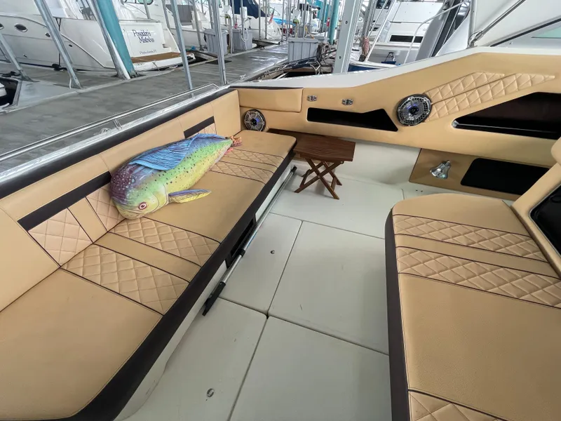 Slide: The Image of 1993 Sea Ray 370 Sundancer engine room with hour meters and wiring. - 24