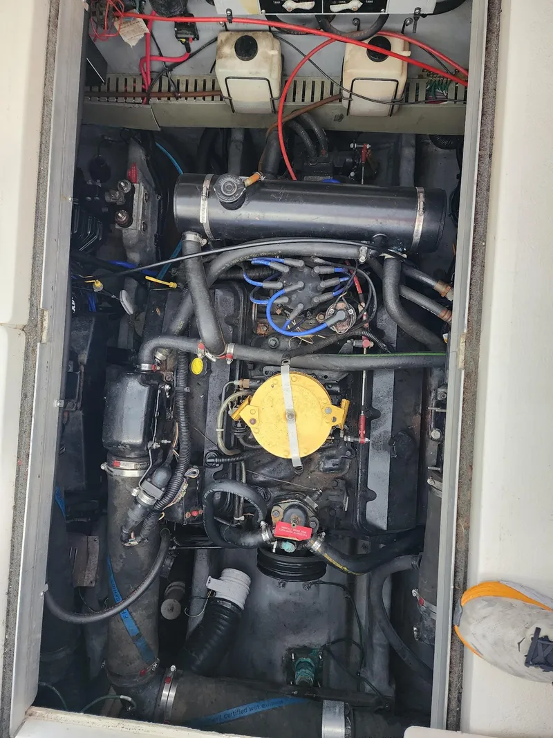 Slide: The Image of Engine compartment of a 1993 Sea Ray 370 Sundancer boat. - 28