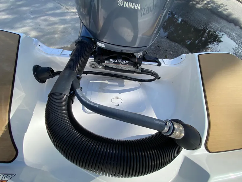 Slide: The Image of 2022 NauticStar 223 DC boat with Yamaha engine and Seastar steering system. - 11