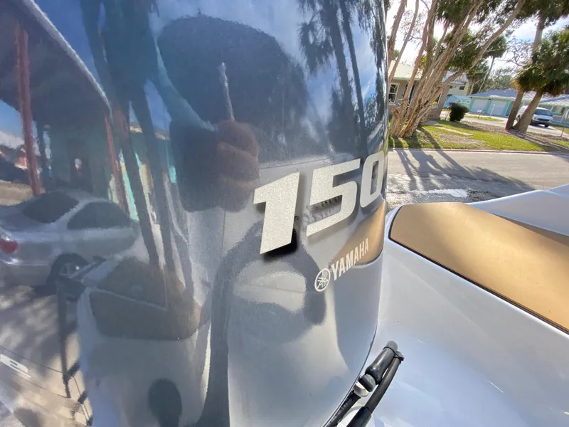 Slide: The Image of Yamaha 150 outboard motor on 2022 NauticStar 223 DC boat. - 12