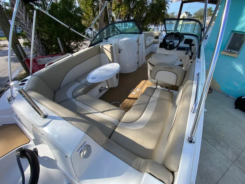 Slide: The Image of 2022 NauticStar 223 DC boat interior with spacious seating and modern design. - 16