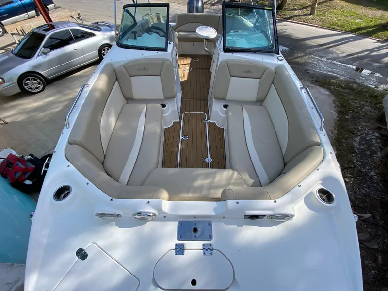 Slide: The Image of 2022 NauticStar 223 DC boat with spacious seating and sleek design. - 40