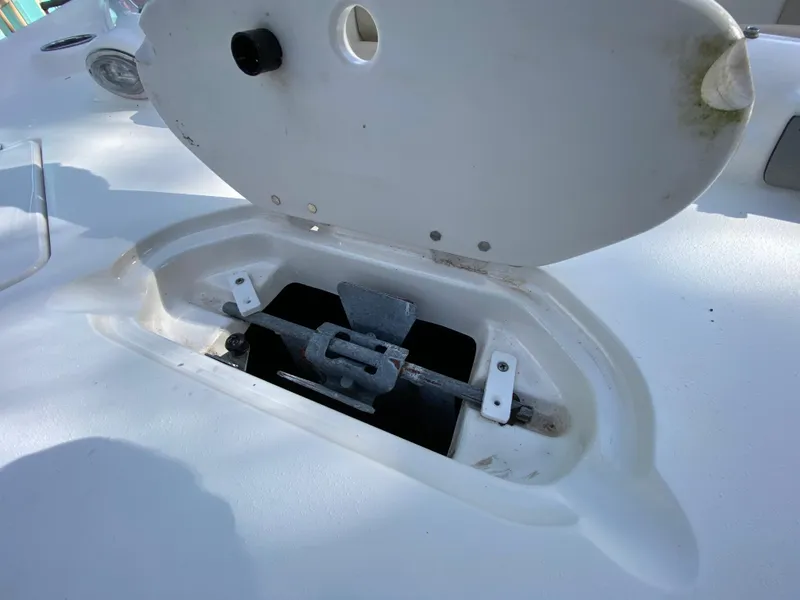 Slide: The Image of Open storage compartment on 2022 NauticStar 223 DC boat. - 42