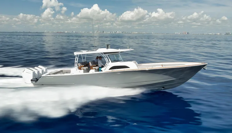Slide: The Image of 2024 Valhalla Boatworks V-46 cruising on open water under clear skies. - 0