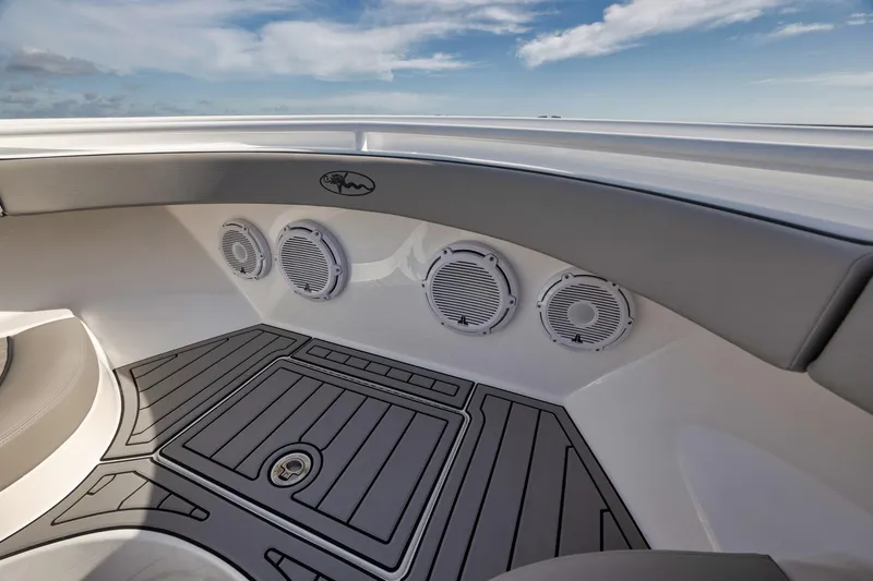 Slide: The Image of 2024 Valhalla Boatworks V-46 interior with sleek design and modern audio system. - 11