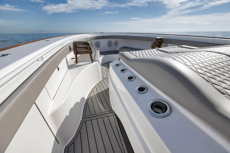 Slide: The Image of 2024 Valhalla Boatworks V-46 deck with luxurious seating and ocean view. - 17