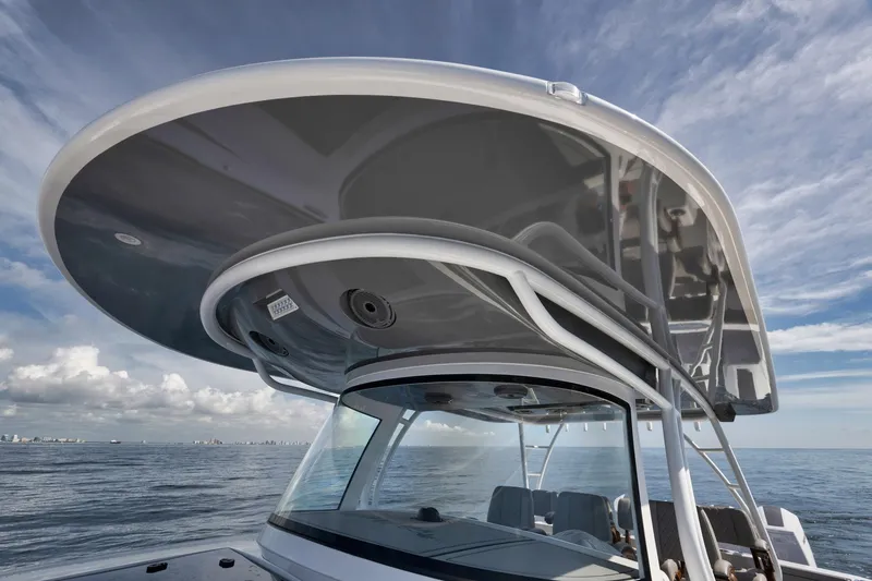 Slide: The Image of 2024 Valhalla Boatworks V-46 with sleek hardtop on open water. - 20