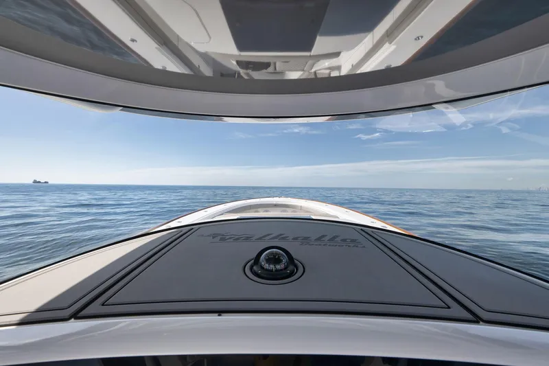 Slide: The Image of 2024 Valhalla Boatworks V-46 cruising on open sea under clear skies. - 21