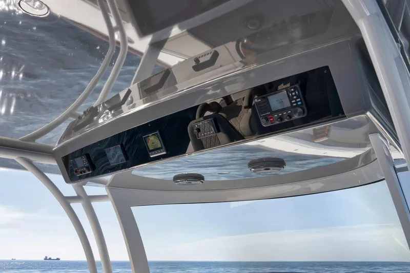 Slide: The Image of 2024 Valhalla Boatworks V-46 helm with modern controls, ocean view. - 25