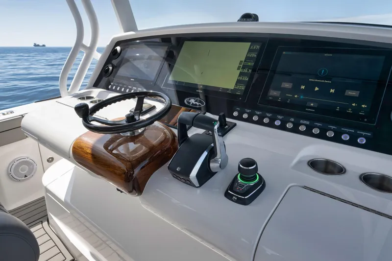 Slide: The Image of 2024 Valhalla Boatworks V-46 helm with advanced navigation and control systems. - 26
