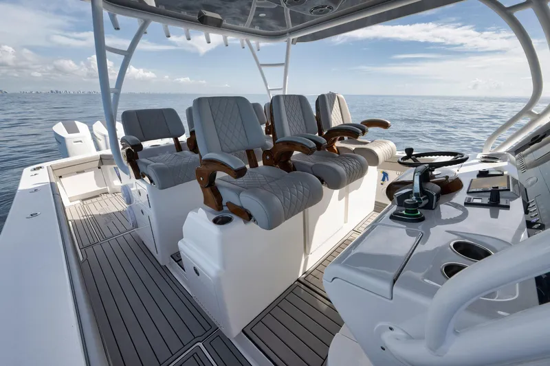 Slide: The Image of 2024 Valhalla Boatworks V-46 interior with luxury seating and ocean view. - 28