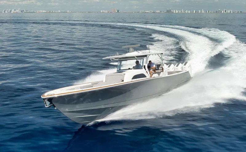 Slide: The Image of 2024 Valhalla Boatworks V-46 cruising on open water, showcasing sleek design and performance. - 3