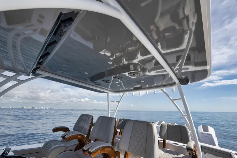 Slide: The Image of 2024 Valhalla Boatworks V-46 interior with luxury seating and ocean view. - 34