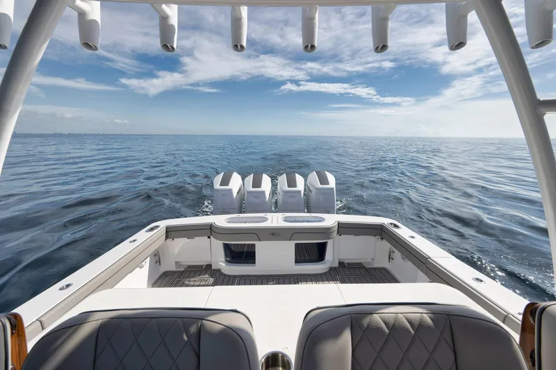 Slide: The Image of 2024 Valhalla Boatworks V-46 on open sea, showcasing powerful engines and sleek design. - 36