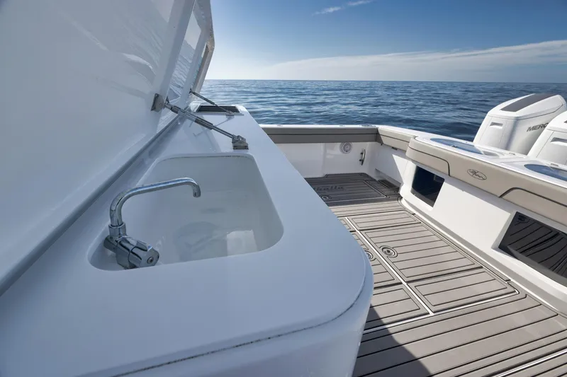 Slide: The Image of 2024 Valhalla Boatworks V-46 deck with sink and ocean view. - 39