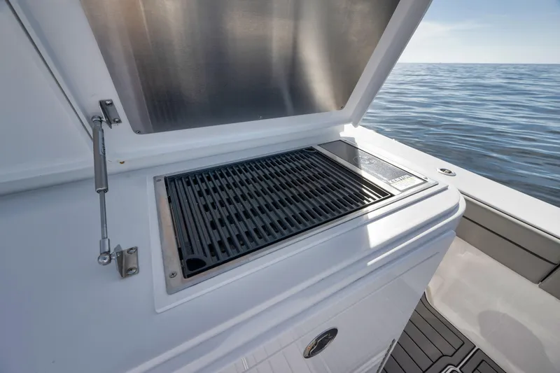 Slide: The Image of 2024 Valhalla V-46 boat grill on deck, ocean view. - 40