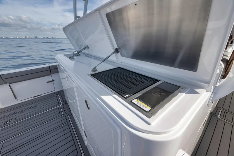 Slide: The Image of 2024 Valhalla V-46 boat with outdoor grill on deck, ocean view. - 41