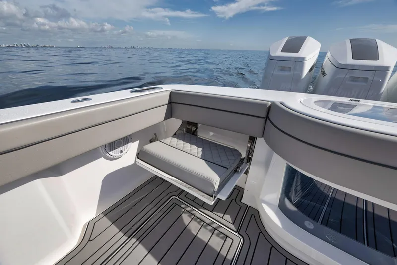 Slide: The Image of 2024 Valhalla Boatworks V-46 interior with sleek seating and ocean view. - 45