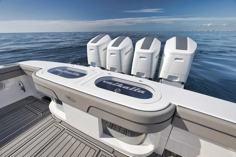 Slide: The Image of 2024 Valhalla Boatworks V-46 with powerful outboard engines on open sea. - 46