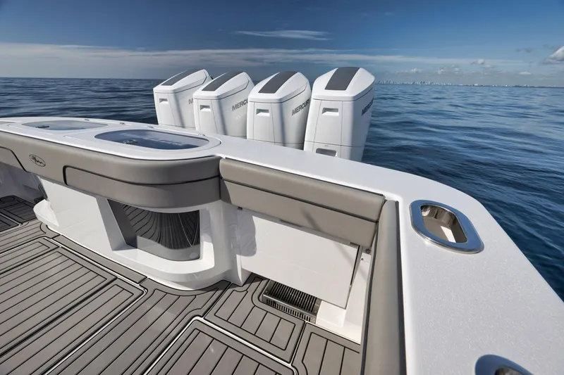 Slide: The Image of 2024 Valhalla Boatworks V-46 with powerful outboard engines on open sea. - 48