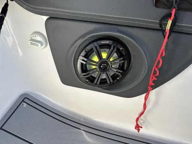 Slide: The Image of 2022 Chaparral 287 SSX boat speaker with red safety cord. - 19