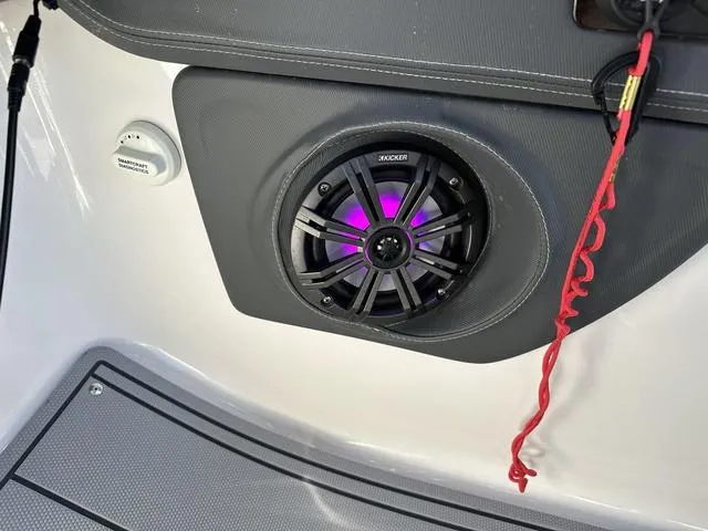 Slide: The Image of 2022 Chaparral 287 SSX boat speaker with purple LED lighting. - 20