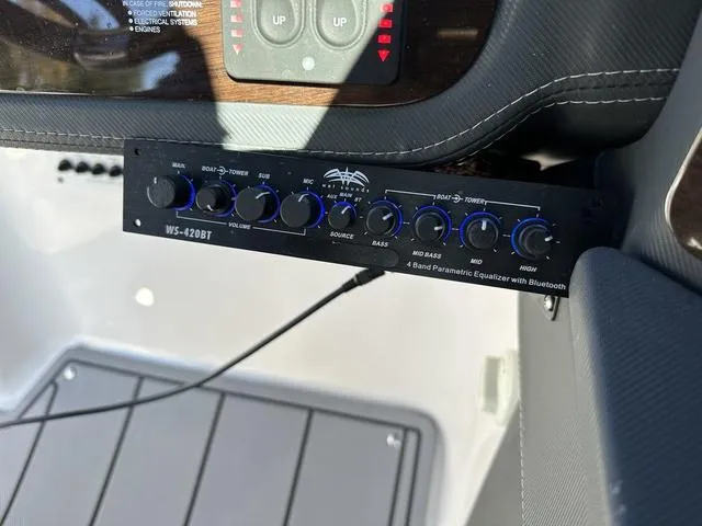 Slide: The Image of Audio control panel in 2022 Chaparral 287 SSX boat with Bluetooth equalizer. - 23