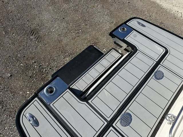 Slide: The Image of 2022 Chaparral 287 SSX swim platform with sleek design and integrated ladder. - 4