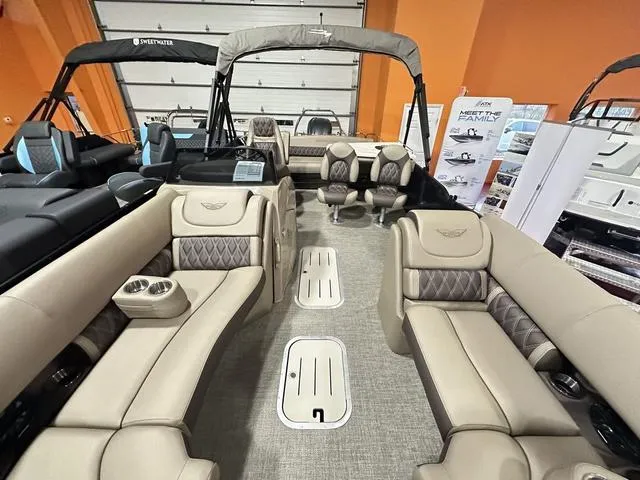 Slide: The Image of 2025 Bennington 24 LXSB pontoon boat interior with luxurious seating and modern design. - 16