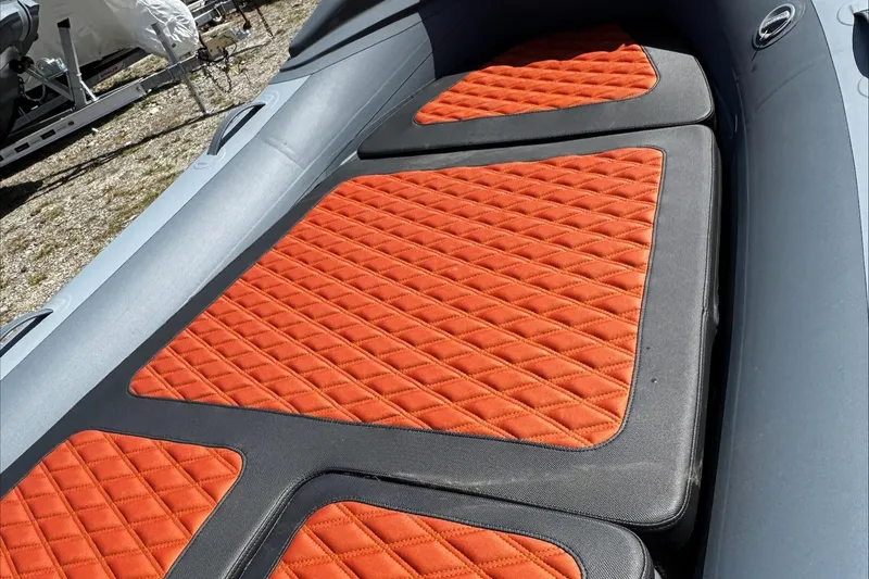 Slide: The Image of Highfield Sport 460 (2025) boat with orange quilted seating. - 4