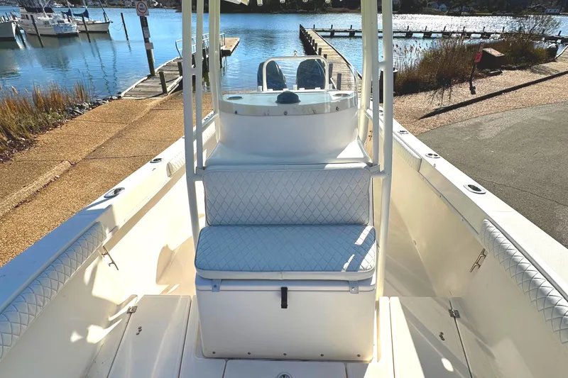 Slide: The Image of 2006 KenCraft 230 SEA KING boat interior at a marina dock. - 12